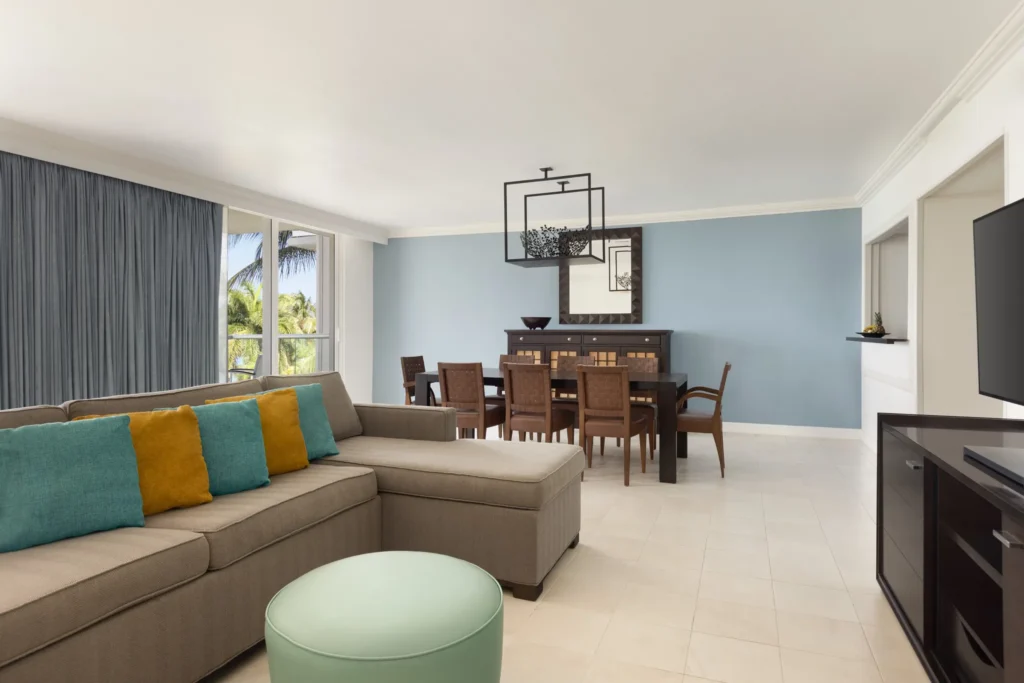 Oceanfront Royal Suite living and dining area at Dreams Rose Hall Resort & Spa in Montego Bay.