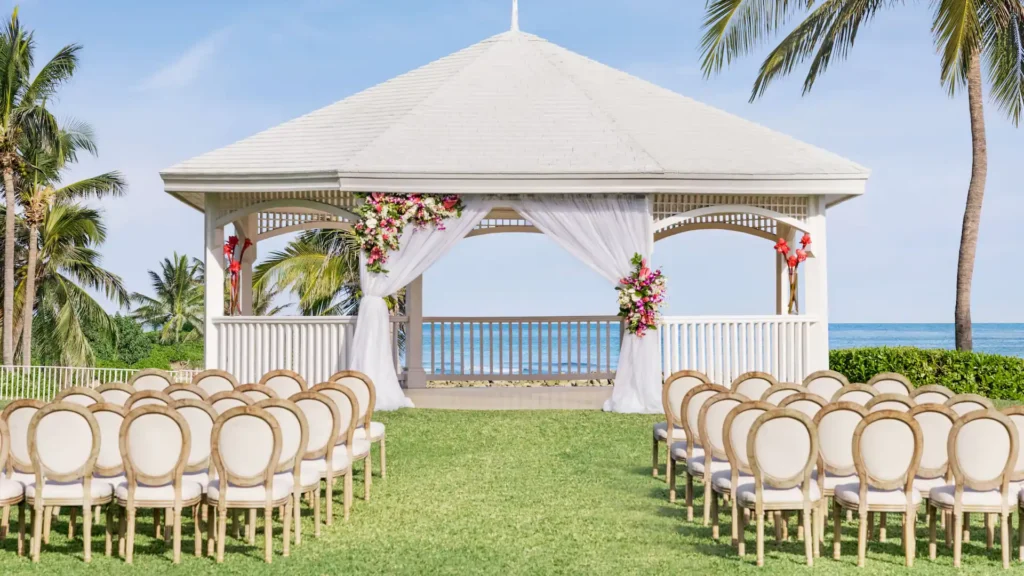 Decorated wedding gazebo overlooking the Caribbean Sea at Dreams Rose Hall Resort & Spa in Montego Bay, Jamaica.