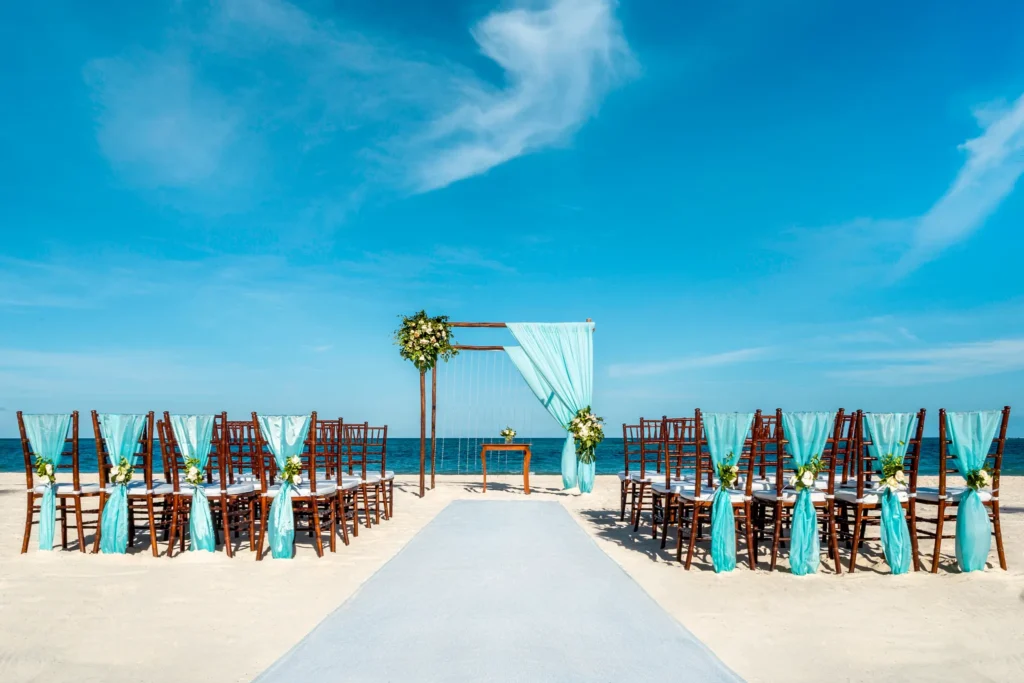 Beach wedding venue with ceremony setup and ocean views at Dreams Royal Beach Punta Cana