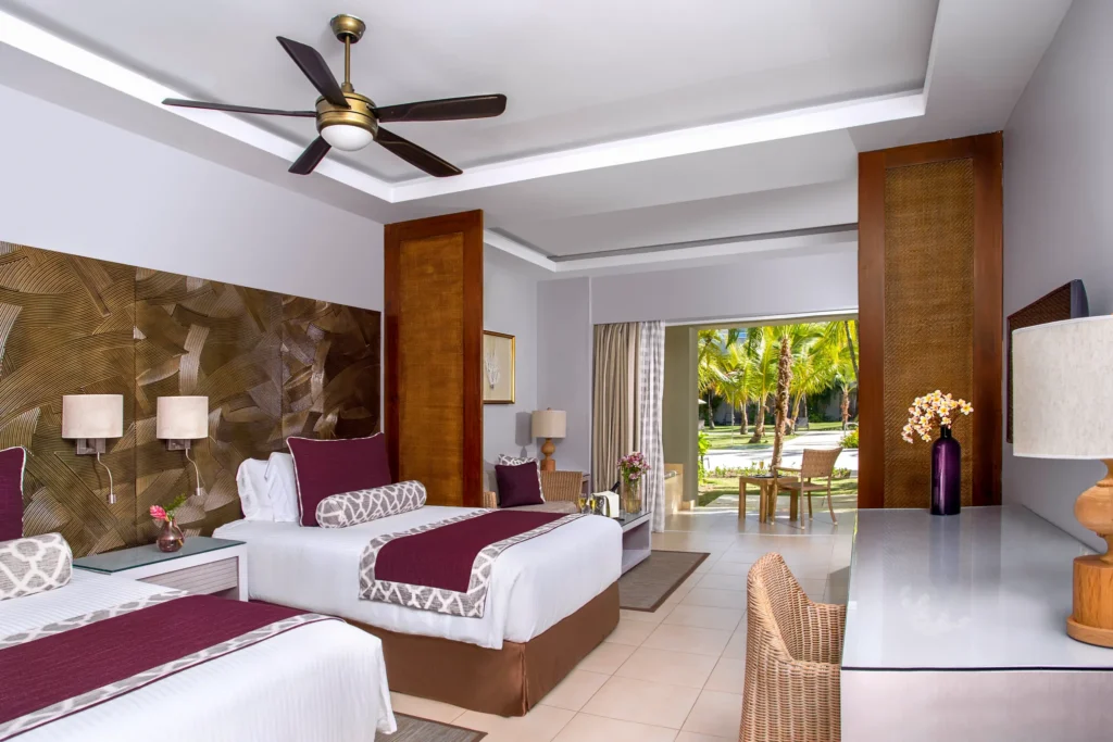 Deluxe Pool Terrace room with two double beds and private terrace with hot tub at Dreams Royal Beach Punta Cana.