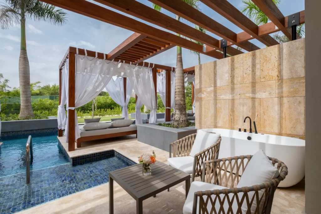 Preferred Club Junior Suite Swim Out terrace with direct pool access and private Bali bed at Dreams Royal Beach Punta Cana.