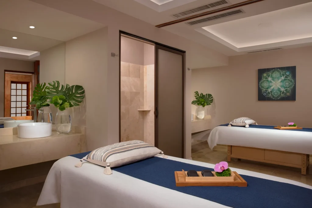 Peaceful spa treatment room with massage tables at Dreams Sands Cancun Resort & Spa.