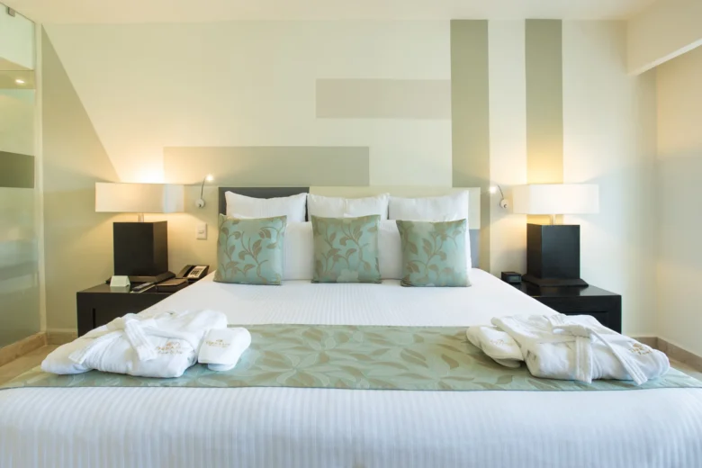 Partial Ocean View king room with contemporary décor at Dreams Sands Cancun Resort & Spa.