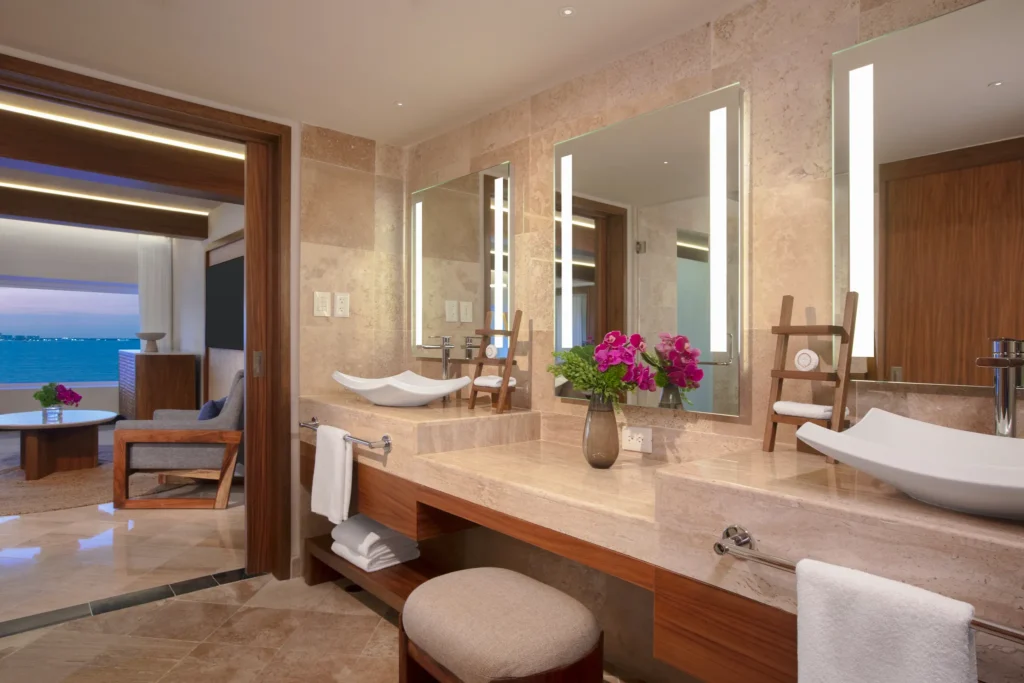 Luxury double vanity bathroom in the Presidential Suite at Dreams Sands Cancun Resort & Spa.