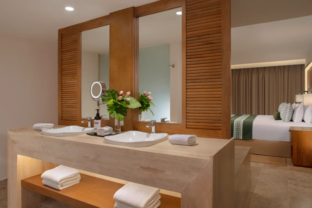 Club Master Suite Ocean Front soaking tub in spacious master bathroom at Dreams Sapphire Resort & Spa.