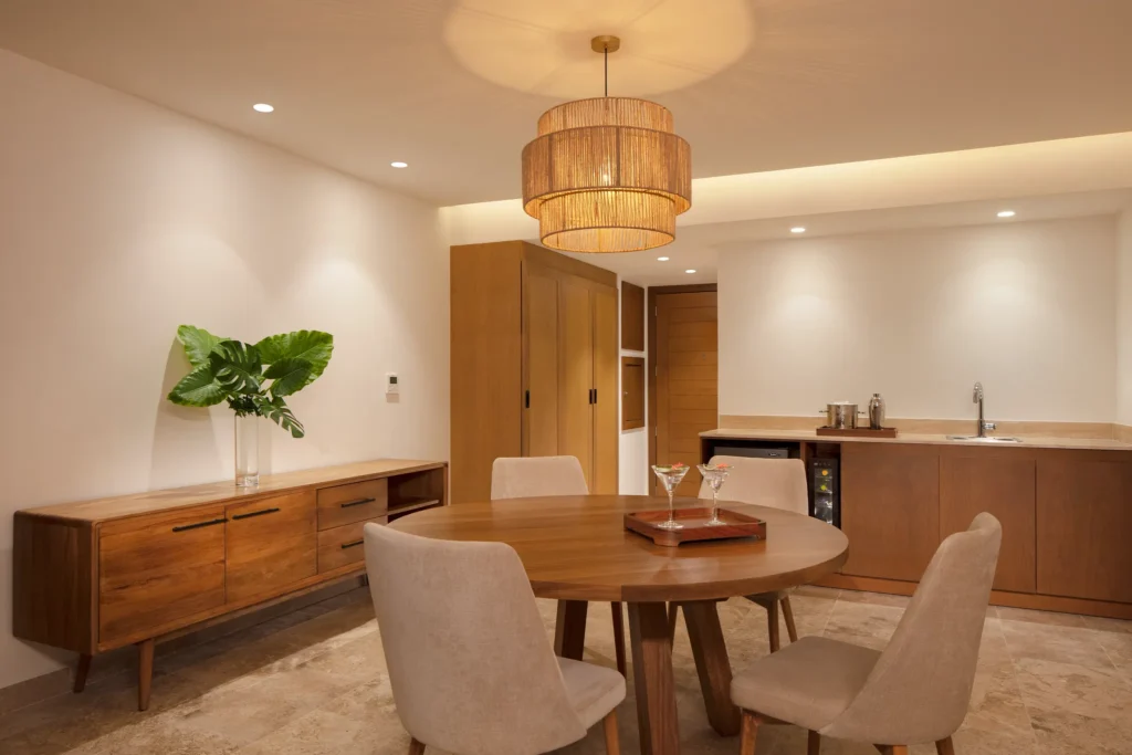 Club Master Suite Ocean Front Swim Out dining area and living space at Dreams Sapphire Resort & Spa.