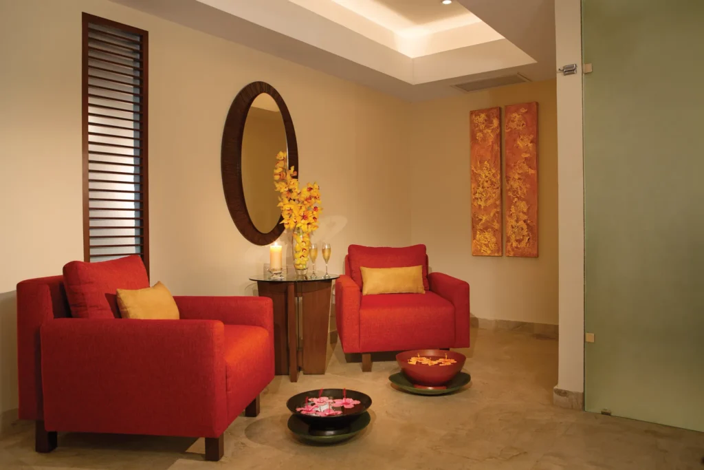 Elegant spa lounge with comfortable seating and relaxing ambiance at Dreams Sapphire Resort & Spa.