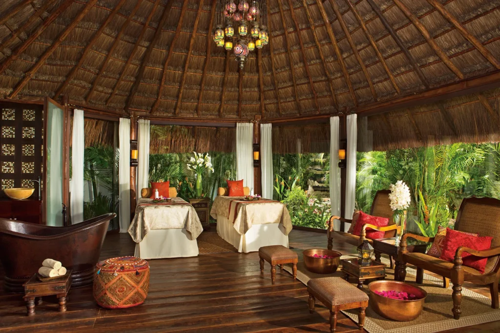 Luxurious holistic spa cabin surrounded by tropical gardens at Dreams Tulum Resort & Spa.
