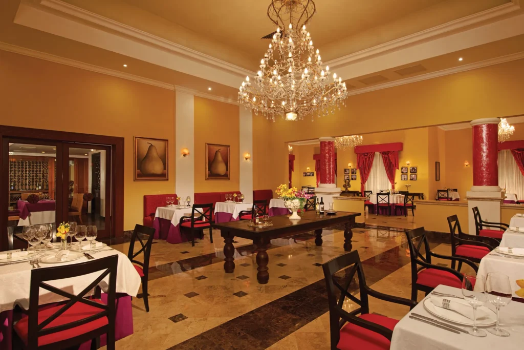 Portofino restaurant at Dreams Tulum Resort & Spa featuring elegant Italian-inspired décor, romantic ambiance, and refined dining experience.