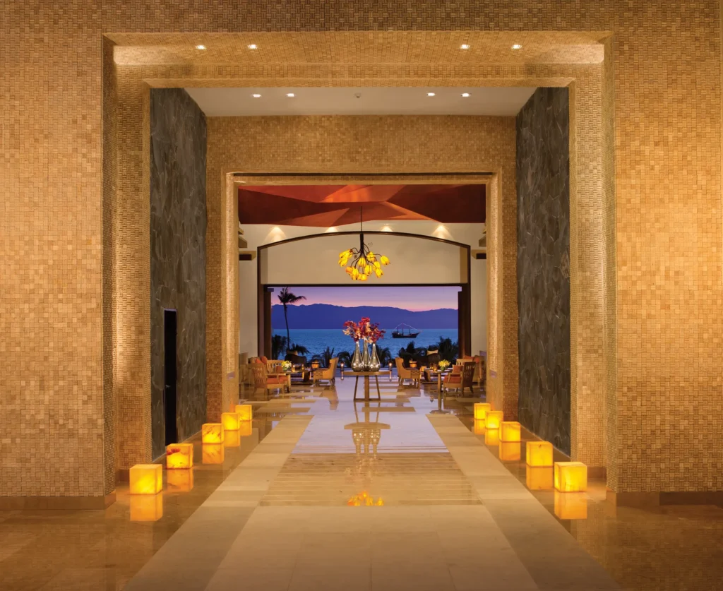 Grand lobby entrance with ocean view at Dreams Vallarta Bay Resort & Spa in Puerto Vallarta.