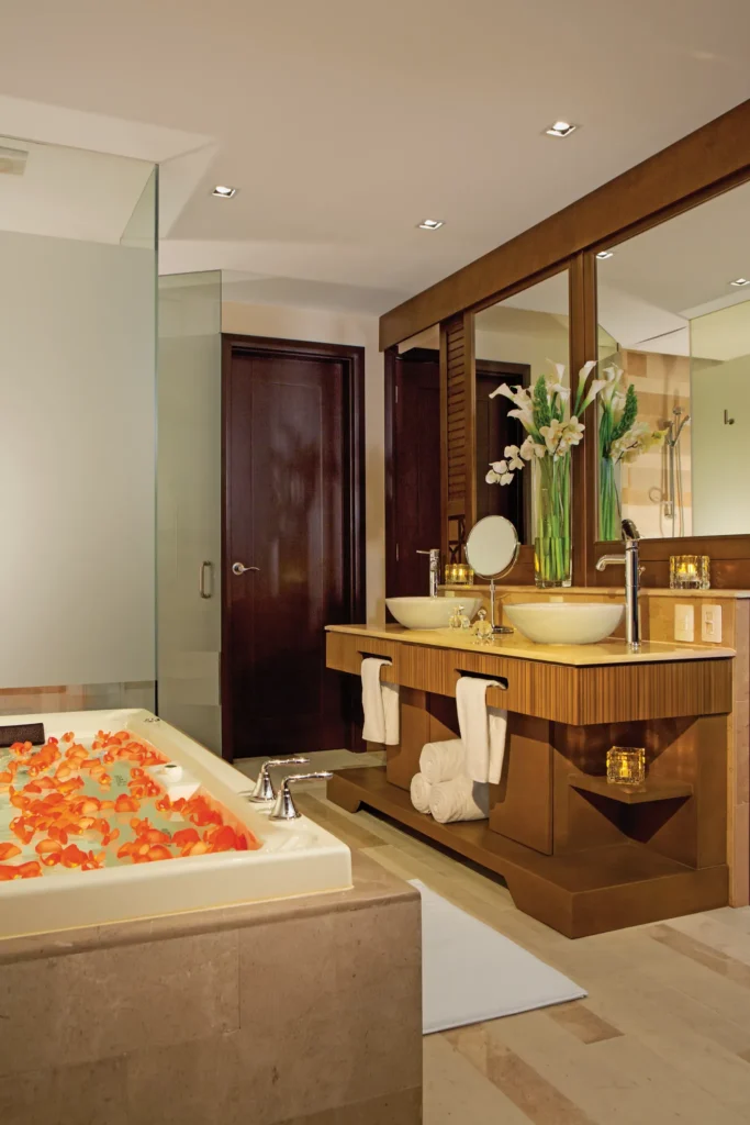Junior Suite Ocean View bathroom with soaking tub and double vanity at Dreams Vallarta Bay Resort & Spa.