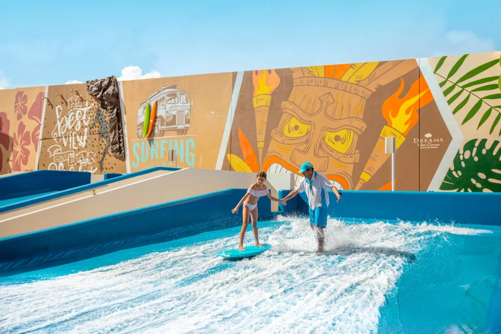 Kids water park with slides and splash features at Dreams Vista Cancun Golf & Spa Resort.