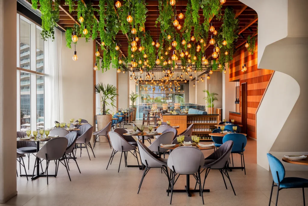 Aglio Italian restaurant at Hyatt Vivid Grand Island serving gourmet Italian dishes and brick-oven pizza in an elegant dining setting.