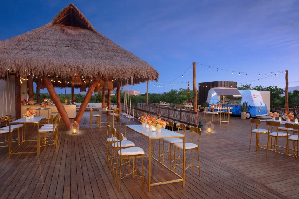 Amber Bar and Vivid Bites rooftop deck setup with tiki bar and lounge seating at Hyatt Vivid Grand Island
