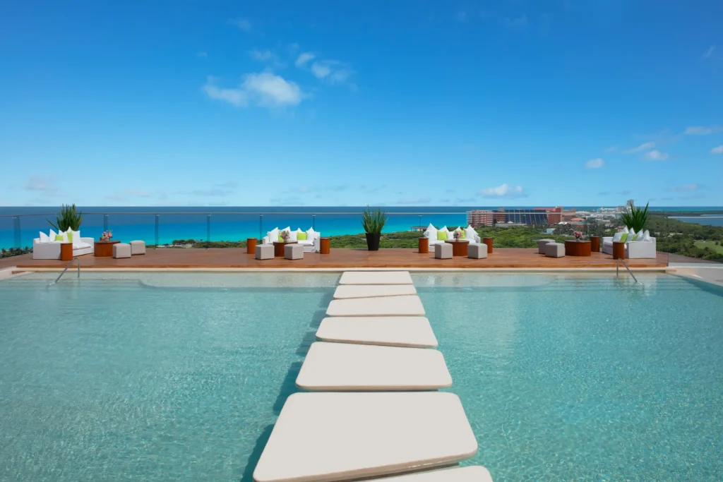 Cobalt Rooftop Deck infinity pool walkway with ocean views at Hyatt Vivid Grand Island