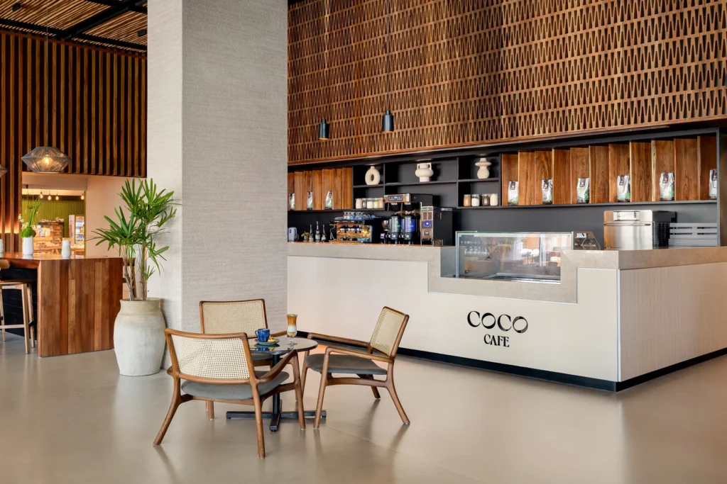 Coco Café at Hyatt Vivid Grand Island serving premium coffee, fresh pastries, sandwiches, and desserts in a cozy café setting.