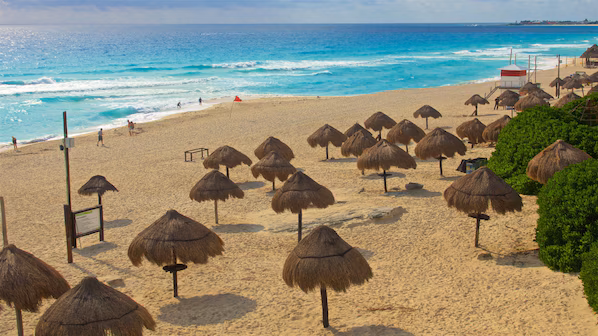 Delfines Beach Cancun wide sandy shoreline near Hyatt Vivid Grand Island