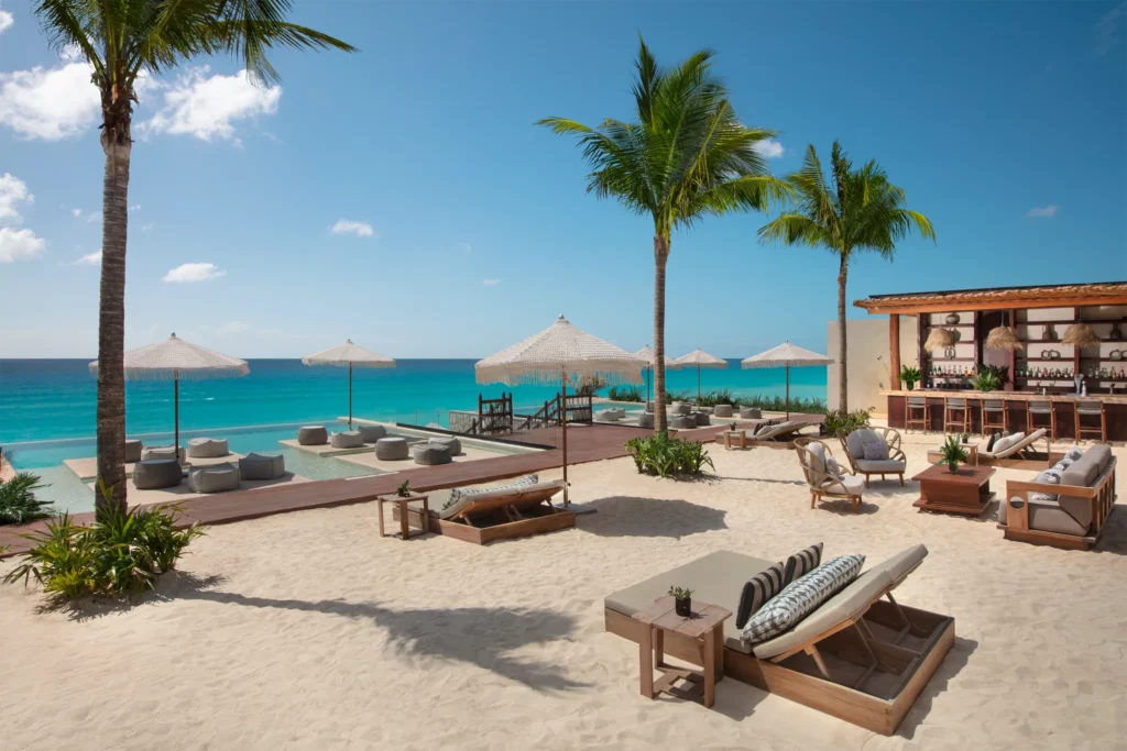 Ennea Pool Terrace beachfront lounge and poolside setup at Hyatt Vivid Grand Island