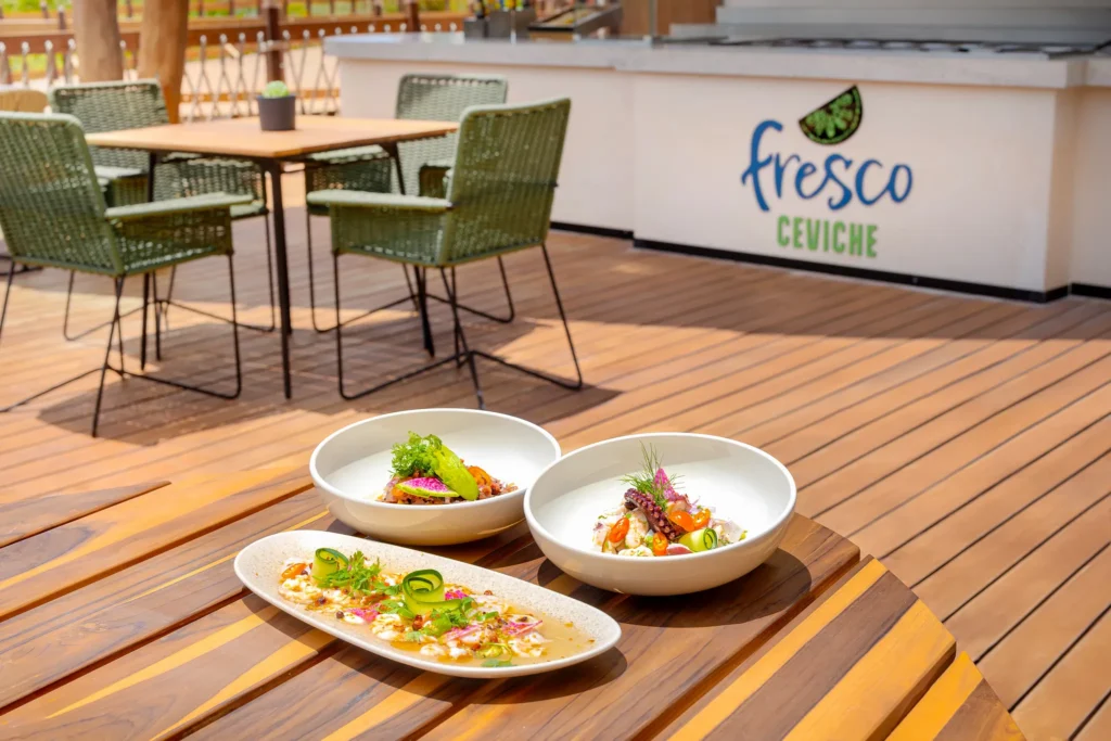 Fresco Ceviche at Hyatt Vivid Grand Island serving fresh ceviche dishes on a poolside deck with a relaxed tropical atmosphere.