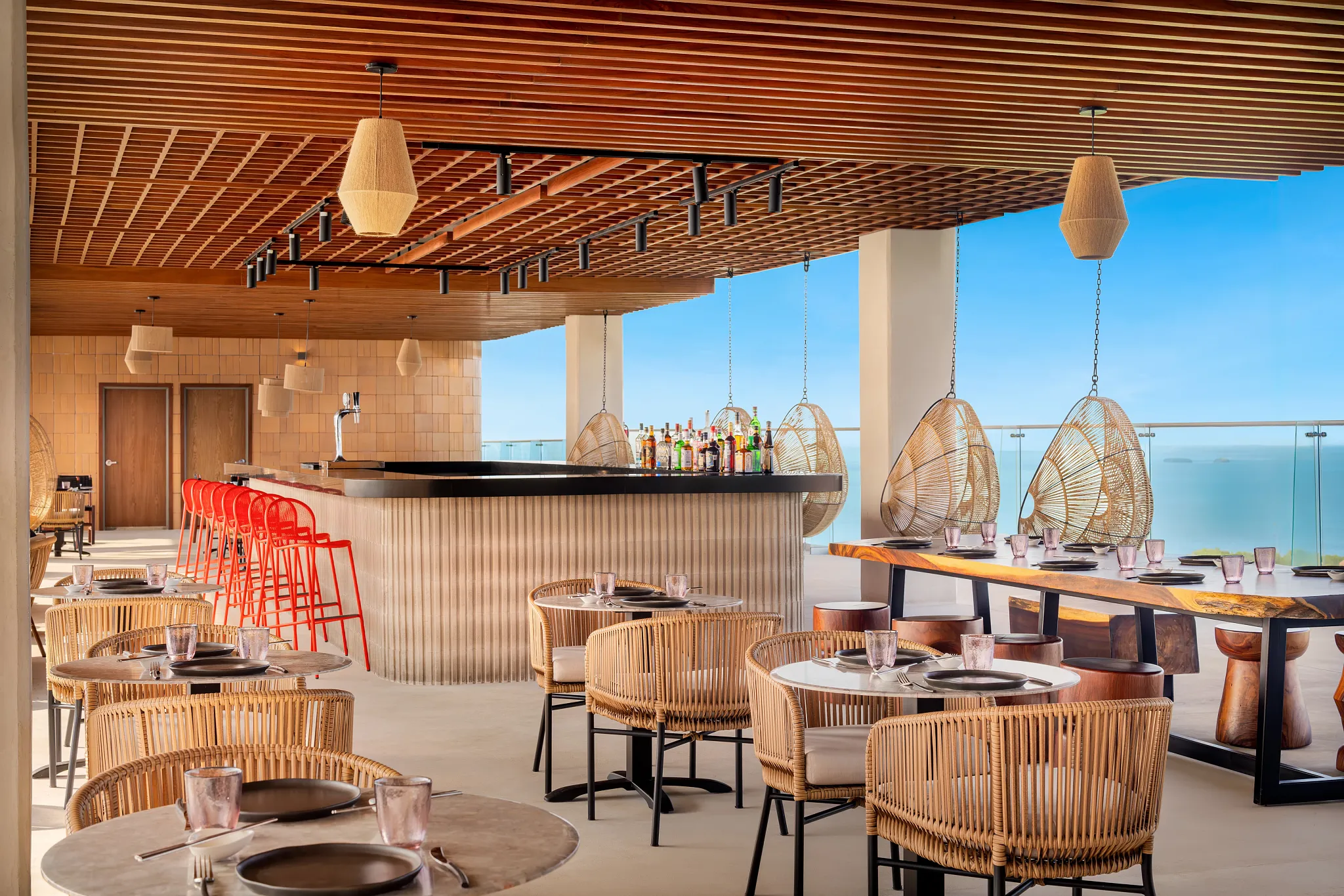 Oishii Japanese restaurant at Hyatt Vivid Grand Island featuring rooftop dining with sushi, modern Japanese dishes, and panoramic Cancun skyline and ocean views.