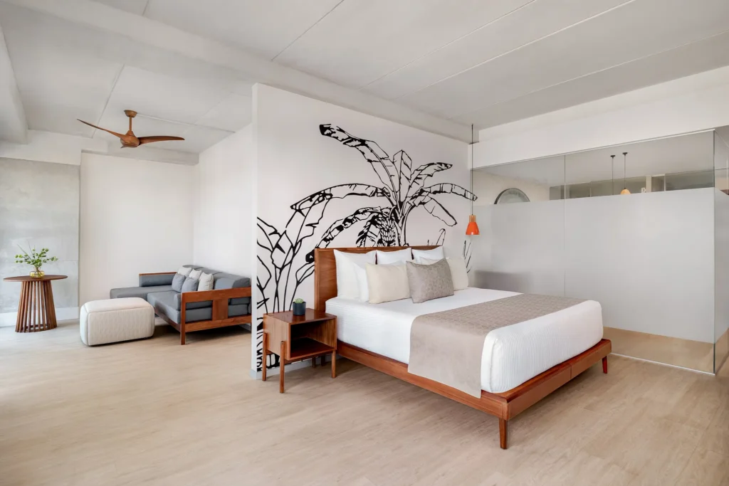 Premium Suite Golf View with king bed, separate living area, and modern décor at Hyatt Vivid Grand Island.