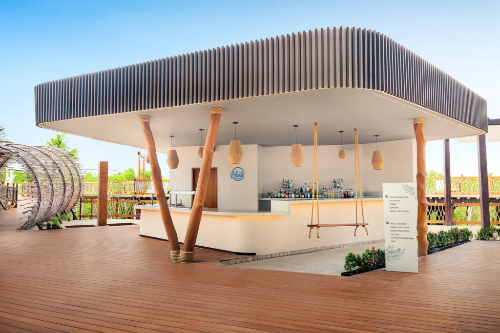 The Hub snack bar at Hyatt Vivid Grand Island offering casual poolside bites with a relaxed daytime atmosphere near the main pool.