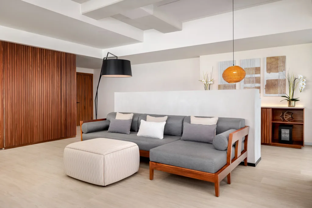 Vantage Club Master Suite living area with sofa seating and modern décor at Hyatt Vivid Grand Island.