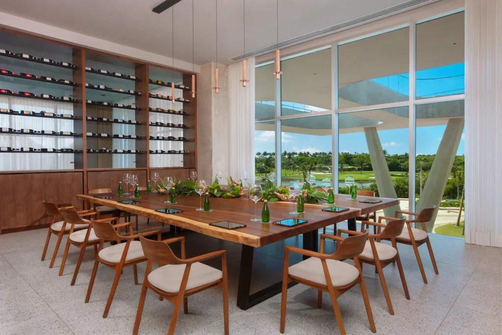 Wine Cellar private dining room with long table and wine wall at Hyatt Vivid Grand Island