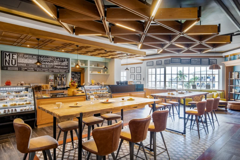Aromas café at Hyatt Vivid Playa del Carmen featuring specialty coffee, fresh pastries, and a cozy contemporary café atmosphere.