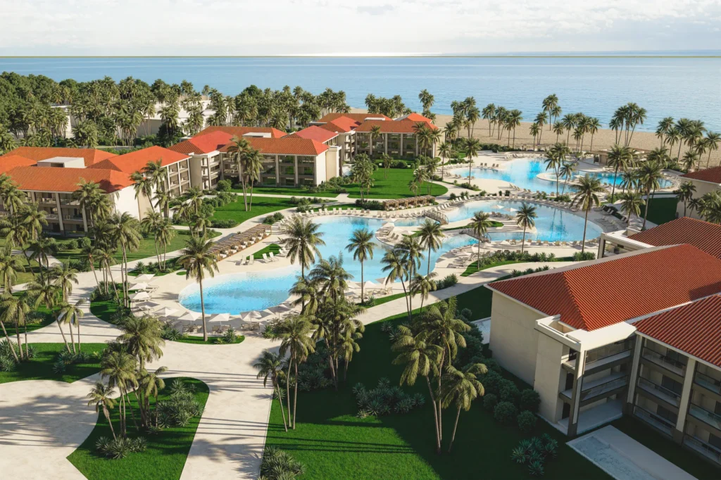 Aerial view of Hyatt Vivid Punta Cana resort pools, tropical gardens, and beachfront location.