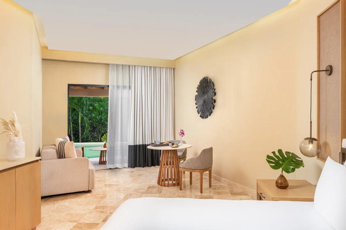 Club Level Junior Suite Tropical View Swim Out King bedroom with terrace and pool access at Hyatt Zilara Riviera Maya.