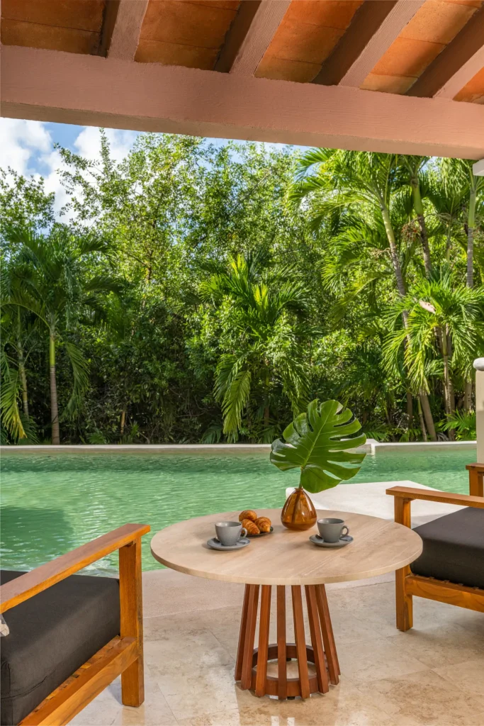 Club Level Junior Suite Tropical View Swim Out terrace with pool access at Hyatt Zilara Riviera Maya.