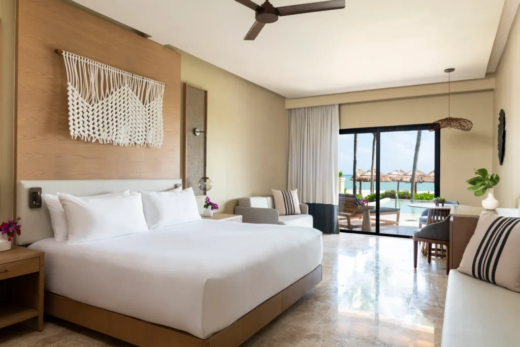Club Level Junior Suite Oceanfront Private Pool King bedroom with terrace and ocean view at Hyatt Zilara Riviera Maya.