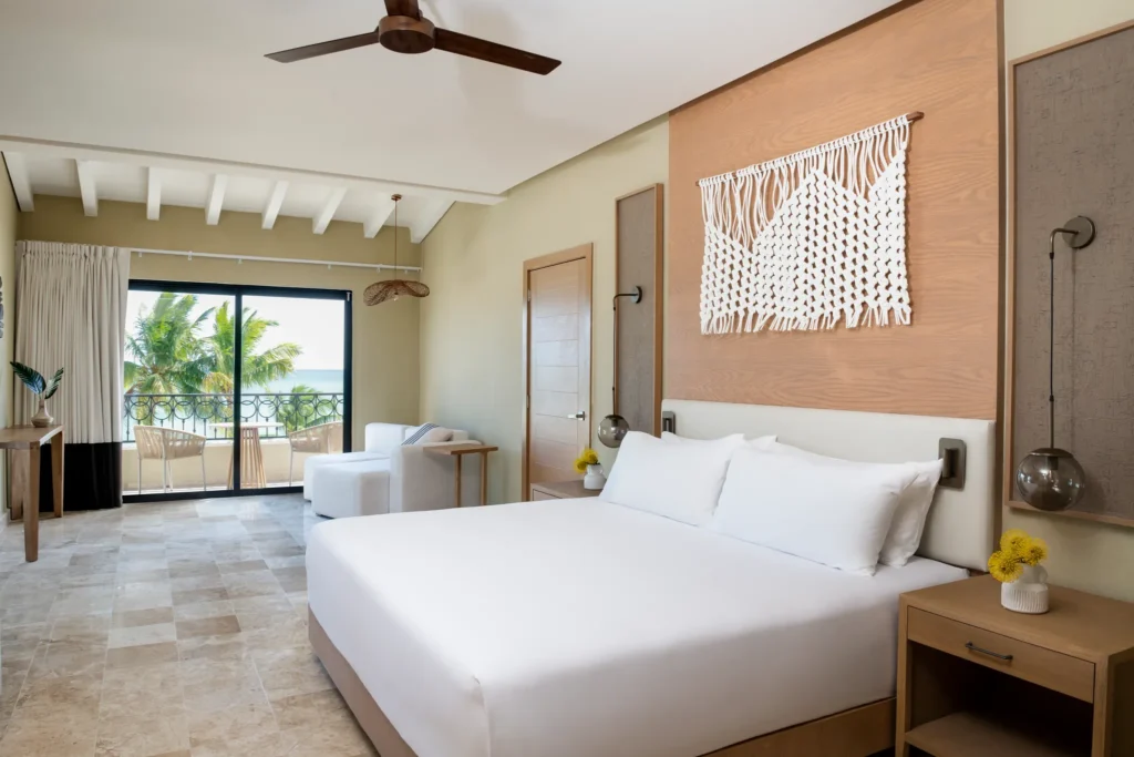 Club Level Presidential Suite King bedroom with king bed and ocean view at Hyatt Zilara Riviera Maya.