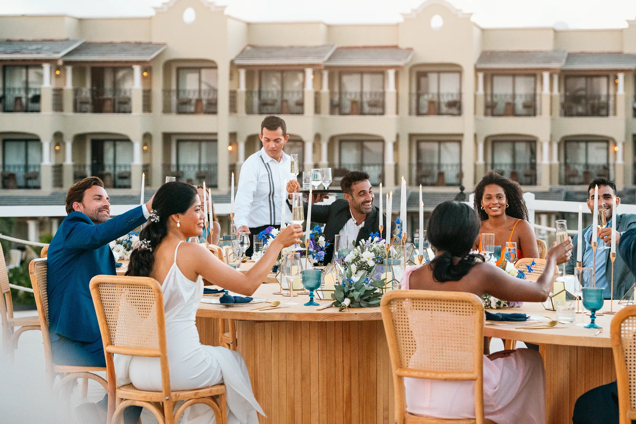 Rooftop terrace wedding reception with dining setup at Hyatt Zilara Riviera Maya