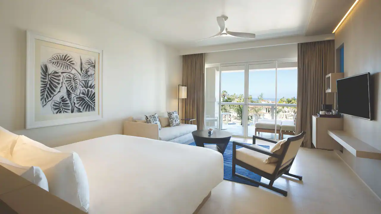 Junior Suite King with private terrace, sleeper sofa, and king bed at Hyatt Zilara Rose Hall.