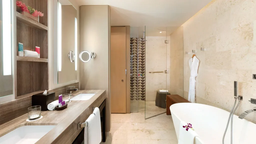 Ocean View Junior Suite King bathroom with soaking tub and rain shower at Hyatt Zilara Rose Hall.
