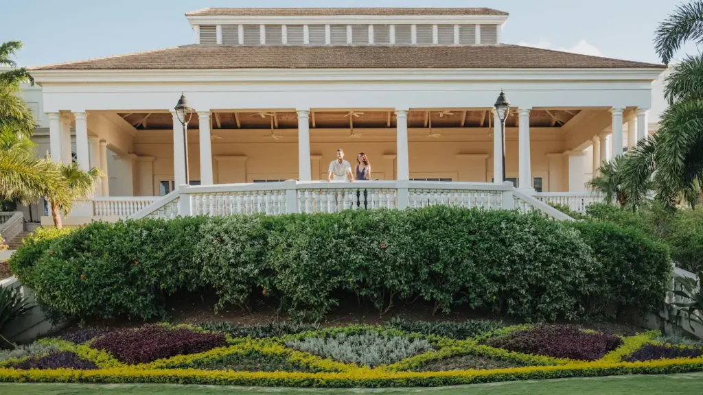Elegant covered terrace reception venue with banquet seating at Hyatt Zilara Rose Hall in Jamaica.
