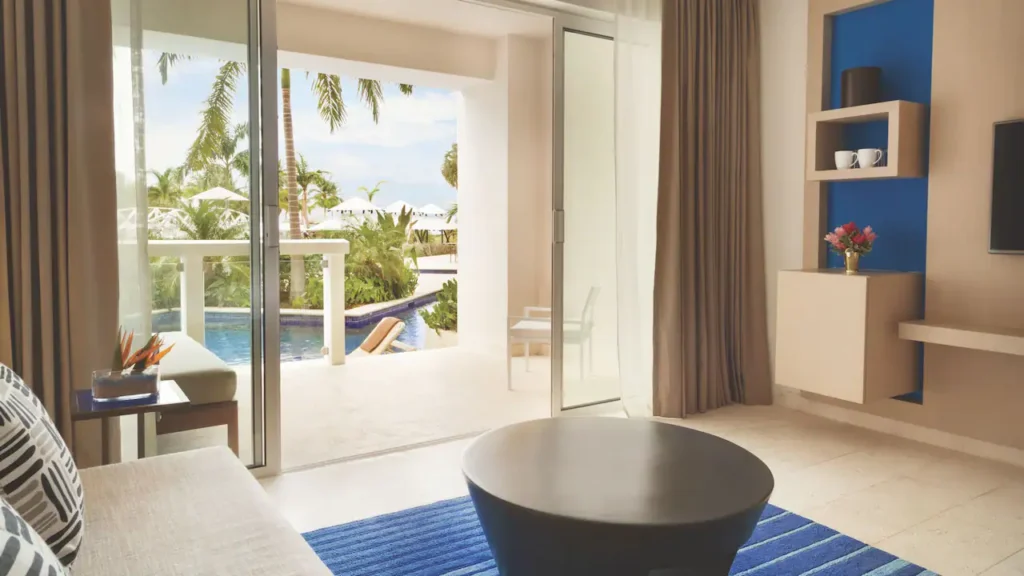 Swim-Up Junior Suite King living area with direct pool access at Hyatt Zilara Rose Hall.