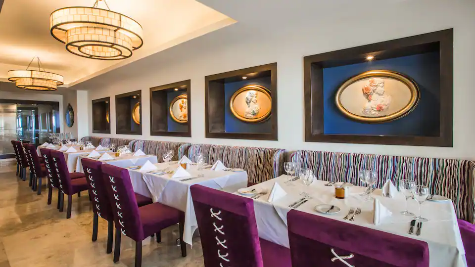 Bon Vivant French restaurant at Hyatt Ziva Los Cabos featuring elegant dining, gourmet cuisine, and an intimate atmosphere.