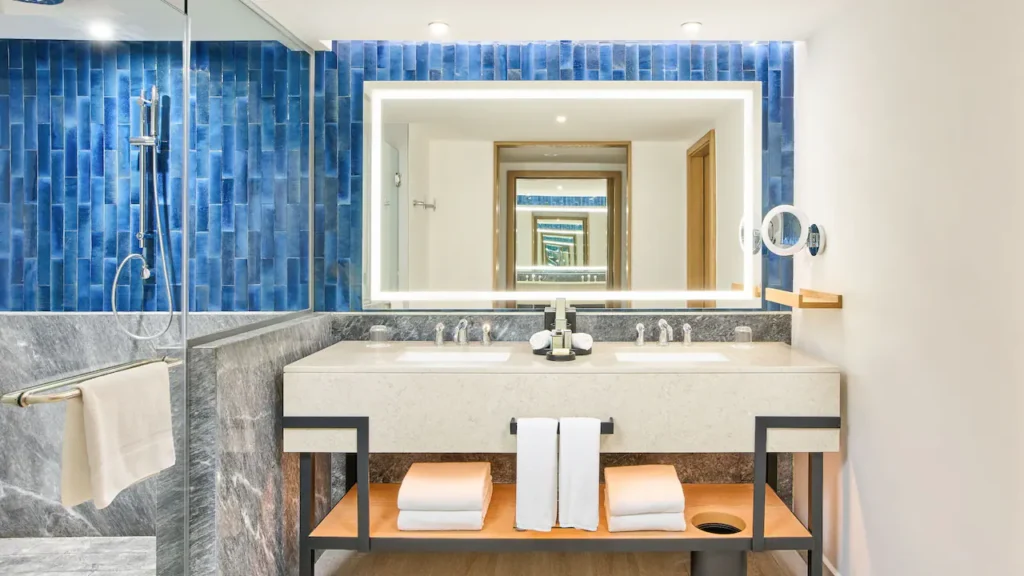 Deluxe Resort View Double bathroom with double vanity and rain shower at Hyatt Ziva Los Cabos.