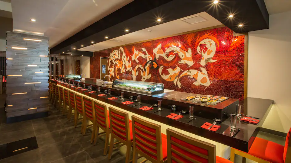 Dozo Asian restaurant at Hyatt Ziva Los Cabos featuring contemporary Japanese-inspired décor, sushi, and teppanyaki dining.