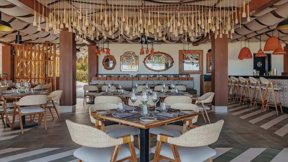 Farina e Olio Italian restaurant at Hyatt Ziva Los Cabos featuring authentic Italian cuisine, rustic décor, and elegant dining.
