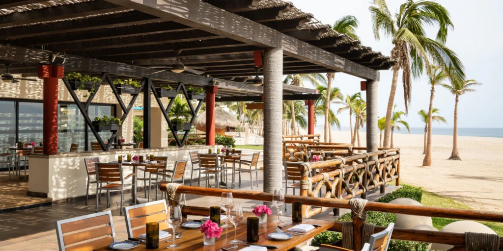 Outdoor beachfront restaurant with ocean views at Hyatt Ziva Los Cabos.