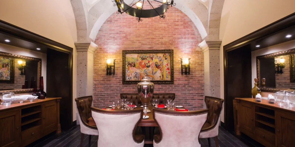 Elegant private dining room with warm décor at Hyatt Ziva Los Cabos.