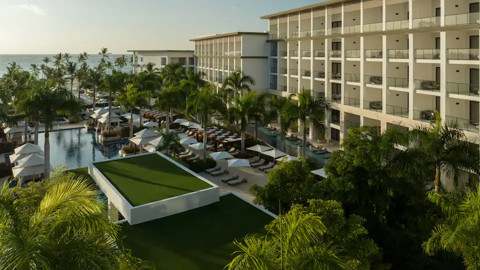 Aerial view of Hyatt Ziva Cap Cana showcasing luxury accommodations, pools, tropical landscaping, and beachfront access in Punta Cana.