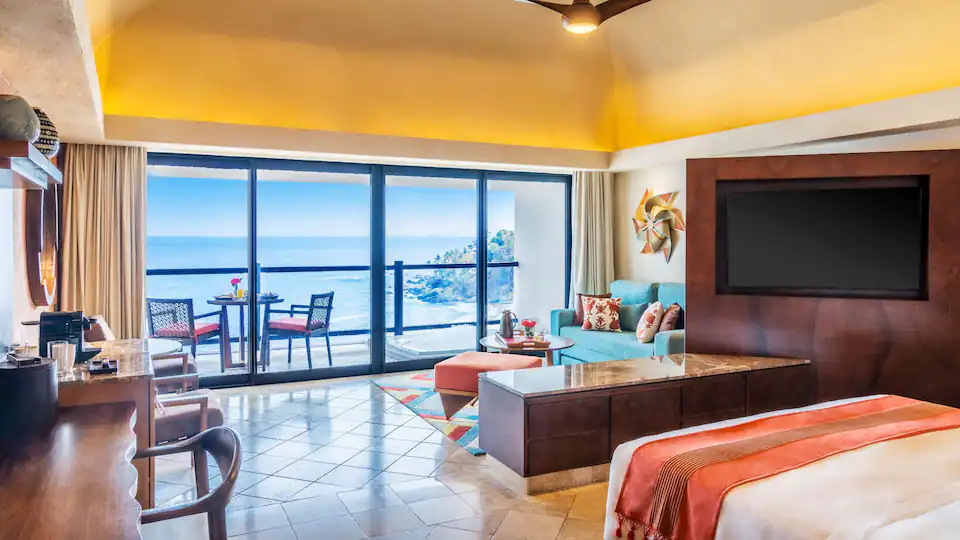 Club Oceanfront Hot Tub King suite with furnished balcony overlooking the Pacific Ocean at Hyatt Ziva Puerto Vallarta.