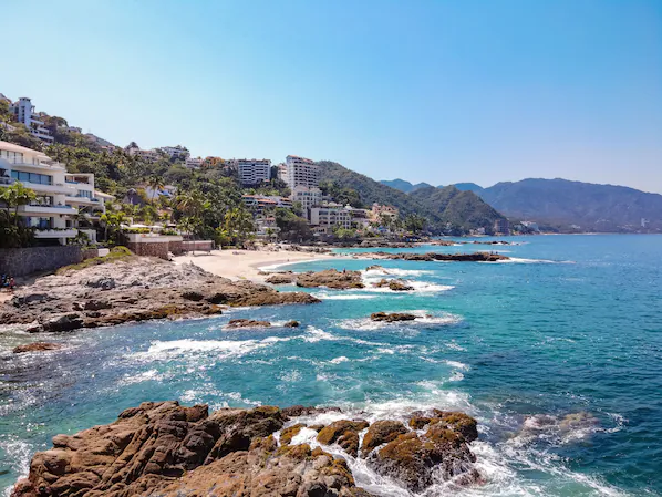 Conchas Chinas Beach near Hyatt Ziva Puerto Vallarta featuring golden sands, clear waters, and picturesque coastal scenery
