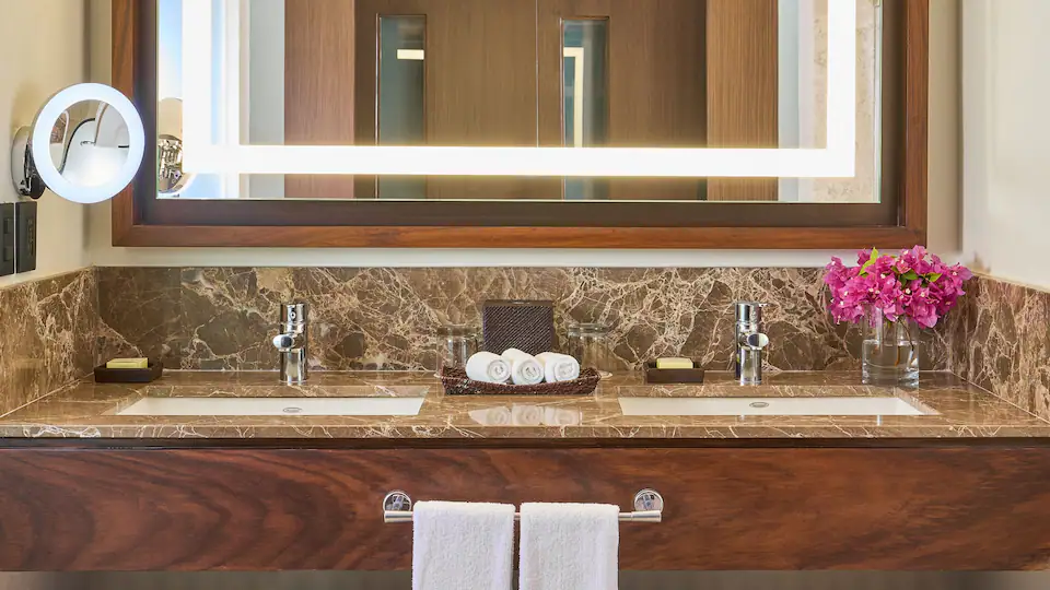 Ocean View Balcony Double bathroom with double vanity and illuminated mirror at Hyatt Ziva Puerto Vallarta.
