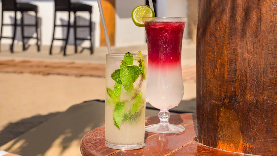 Playa Bar at Hyatt Ziva Puerto Vallarta featuring beachfront seating, tropical cocktails, and panoramic views of the Pacific Ocean.